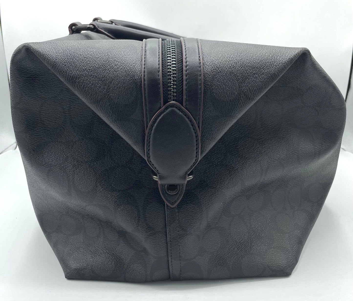 Coach Trekker Duffle – Signature Canvas with Oxblood Accents