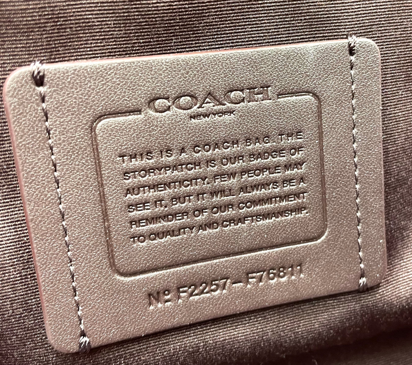 Coach Trekker Duffle – Signature Canvas with Oxblood Accents
