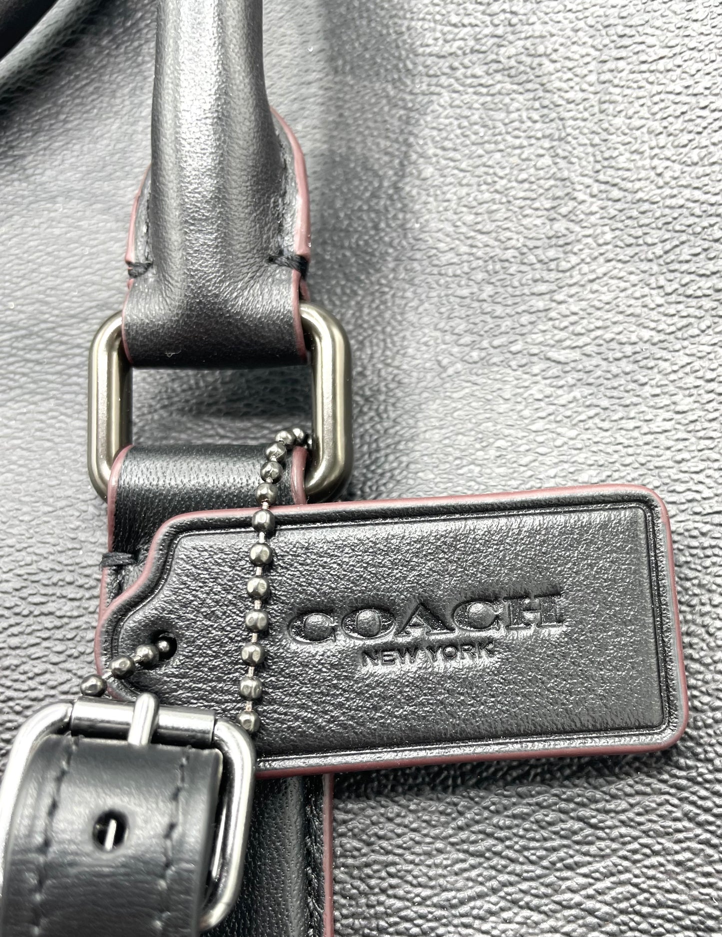 Coach Trekker Duffle – Signature Canvas with Oxblood Accents