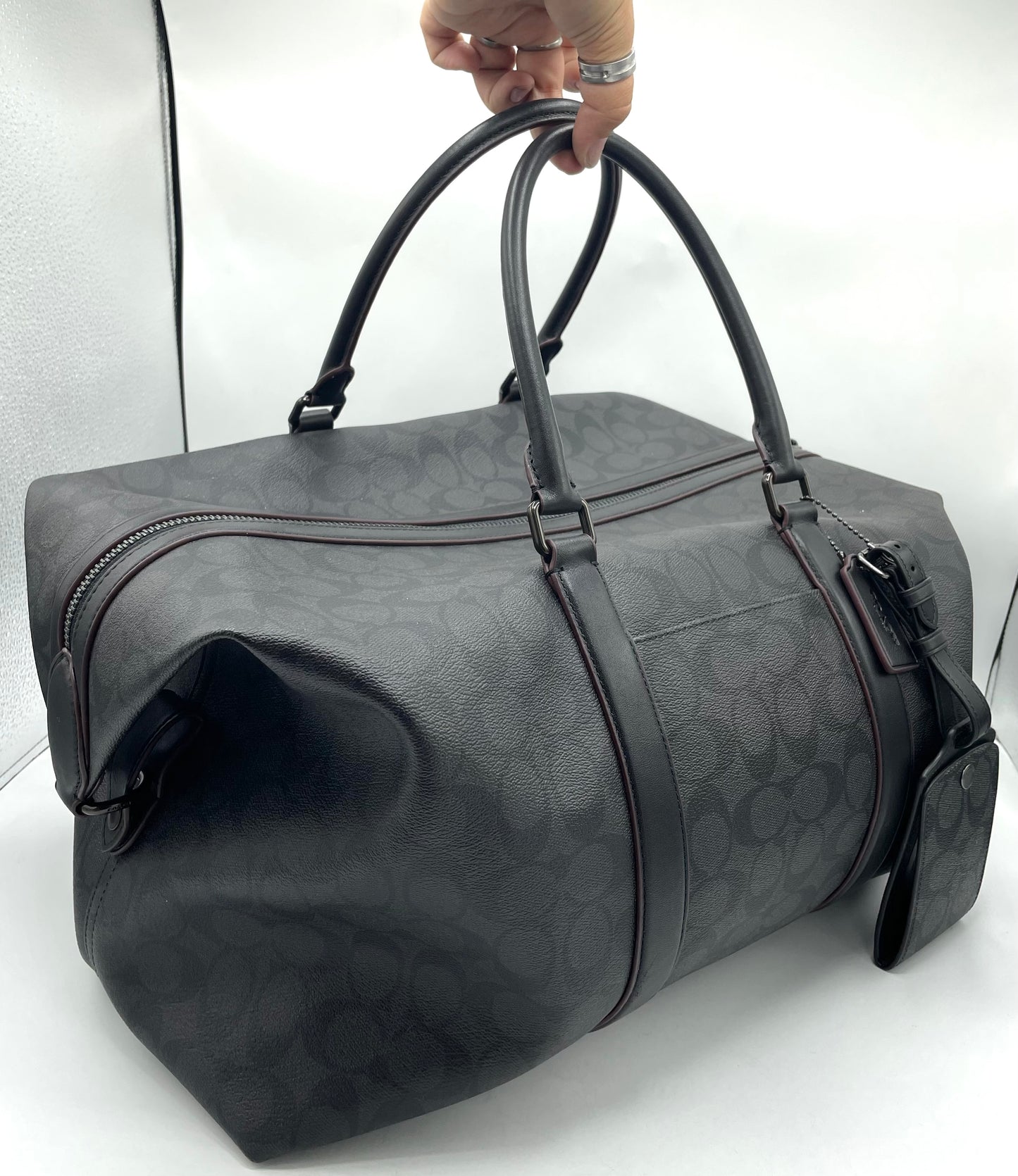 Coach Trekker Duffle – Signature Canvas with Oxblood Accents