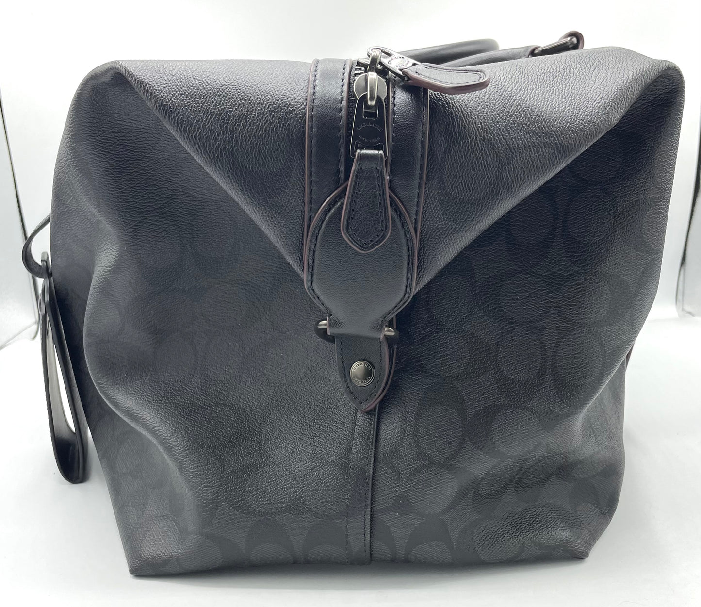 Coach Trekker Duffle – Signature Canvas with Oxblood Accents