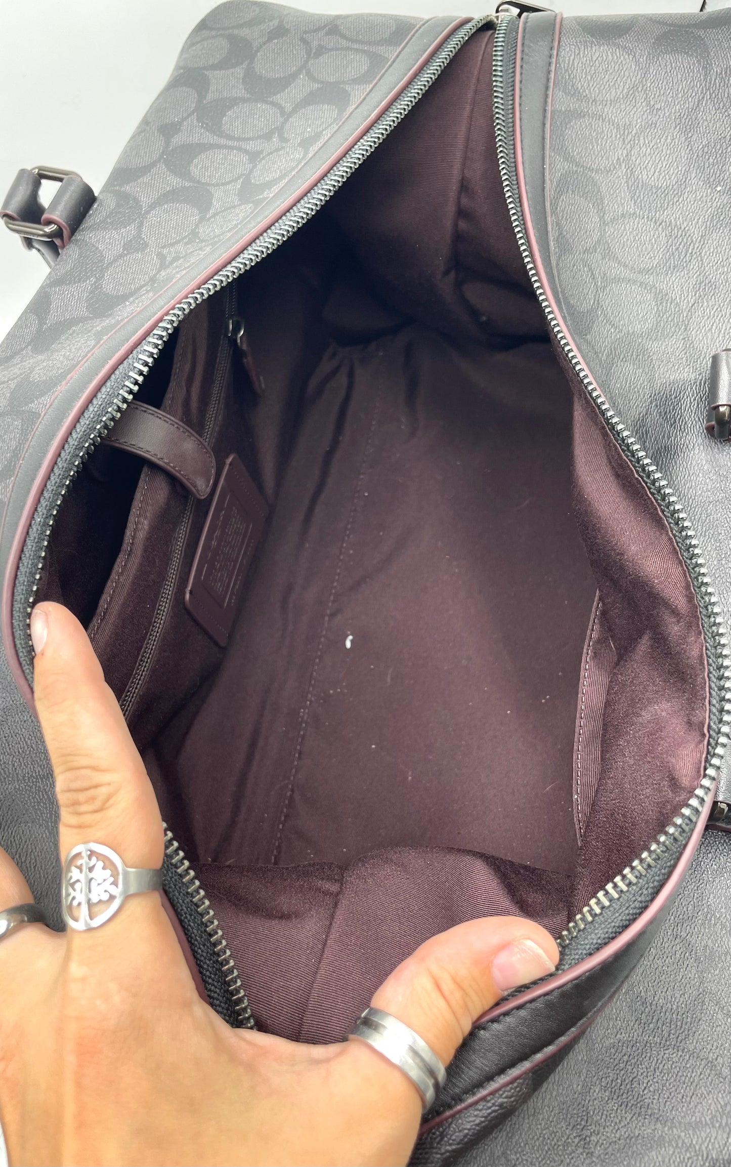 Coach Trekker Duffle – Signature Canvas with Oxblood Accents