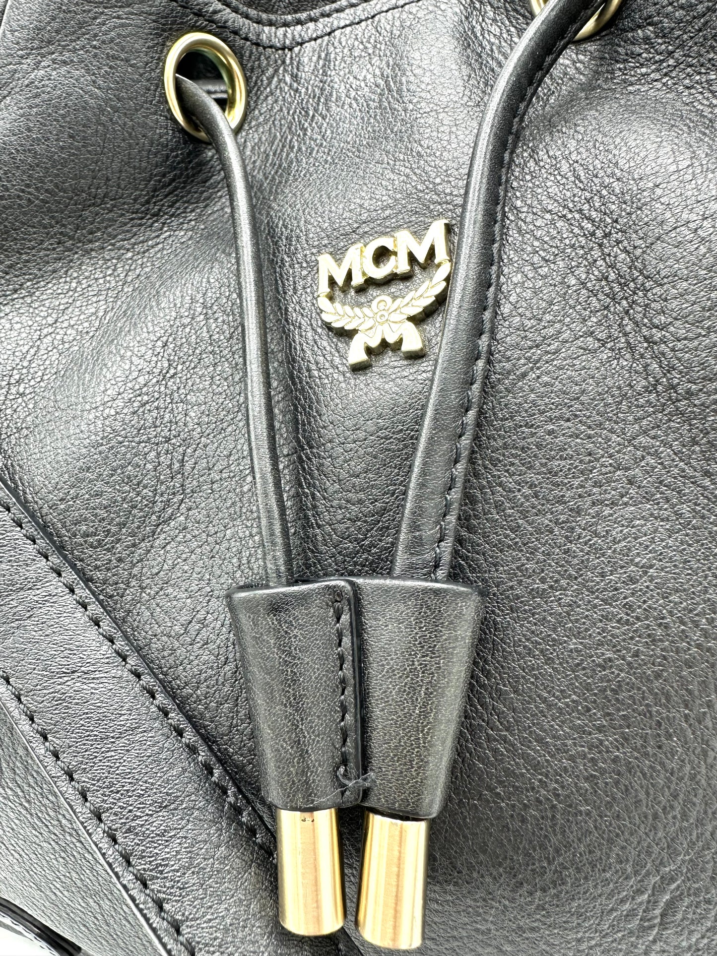 MCM Drawstring Bucket Bag in Leather – Dark Gray Leather with Gold Hardware
