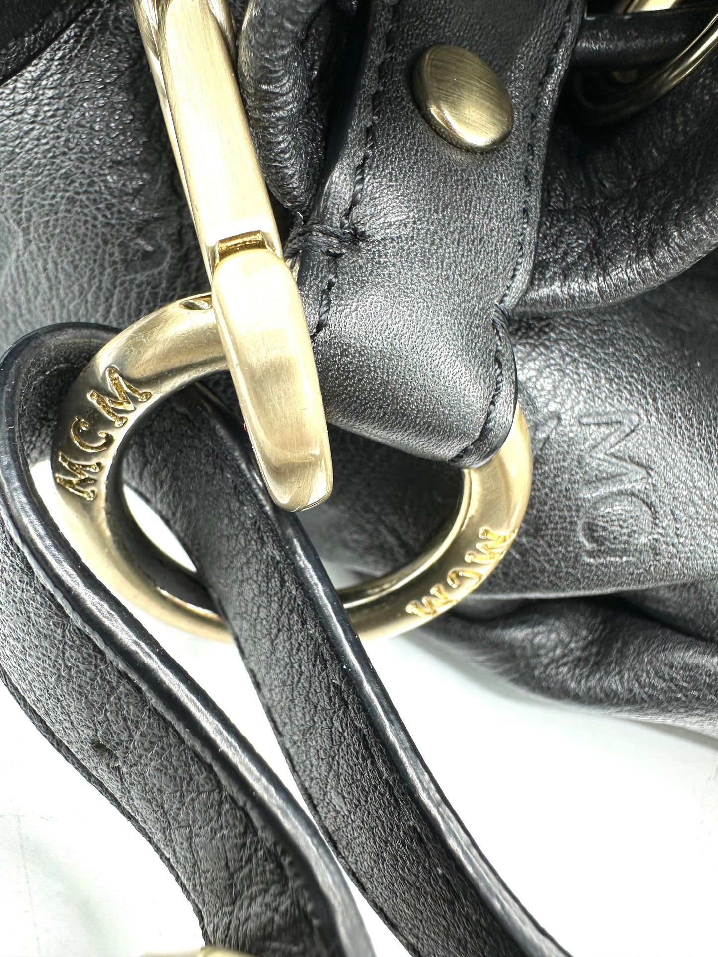 MCM Drawstring Bucket Bag in Leather – Dark Gray Leather with Gold Hardware