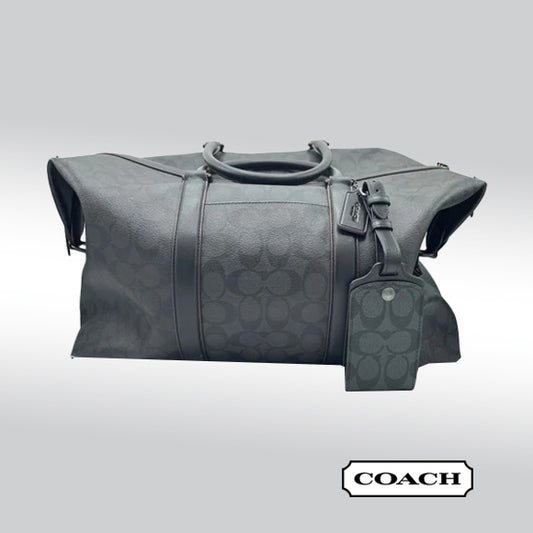 Coach Trekker Duffle – Signature Canvas with Oxblood Accents